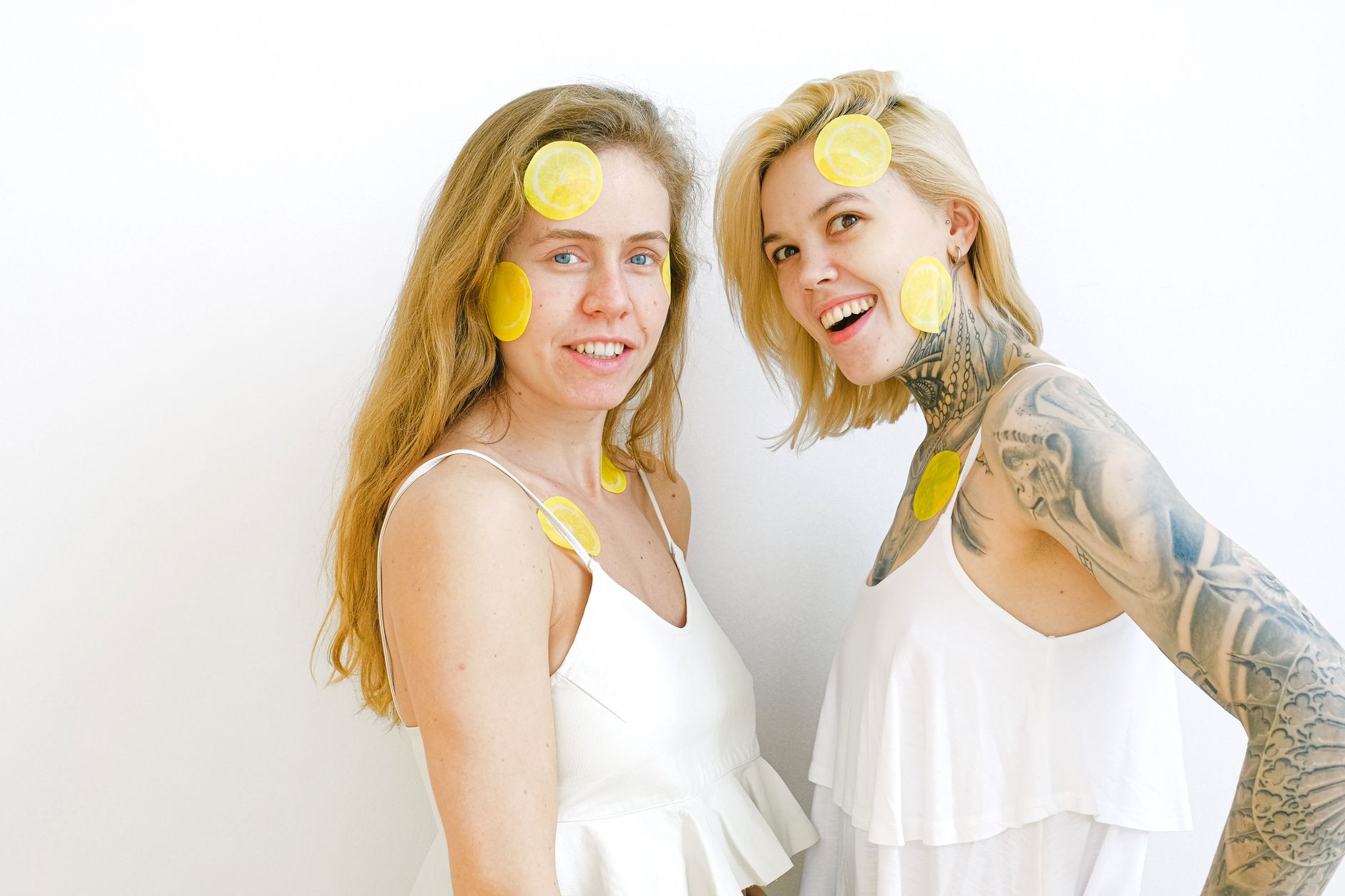Two women laughing together, expressing joy and connection