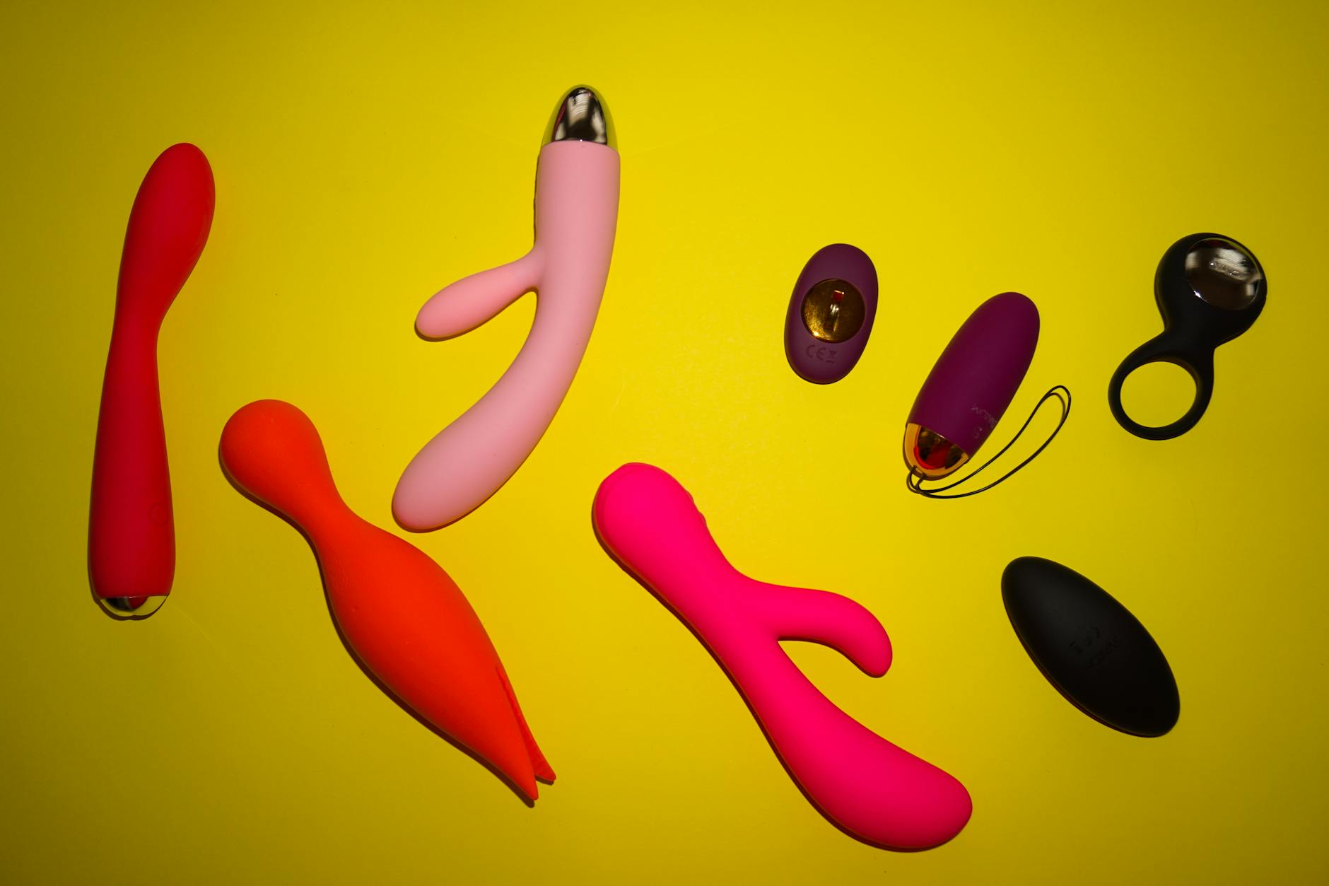 Woman holding a lemon clitoral vibrator, showing intentional engagement with pleasure recovery